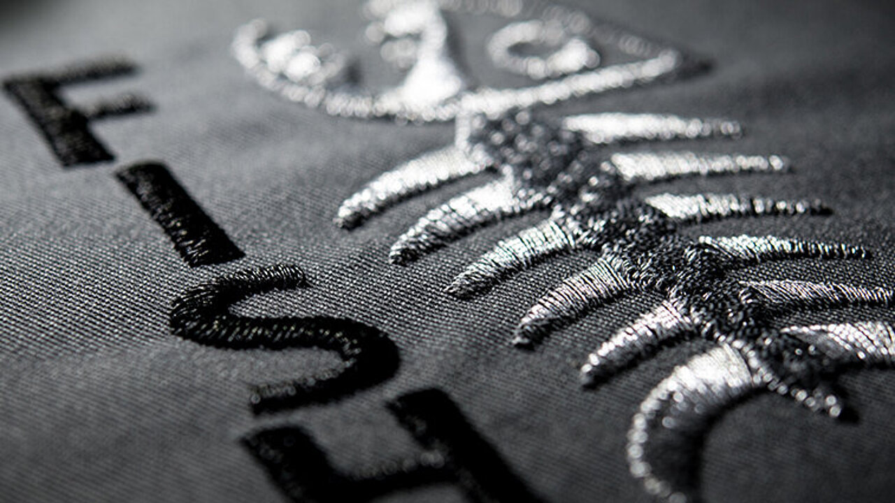 [Translate to Global Französisch:] silver fish bone metallic embroidery design